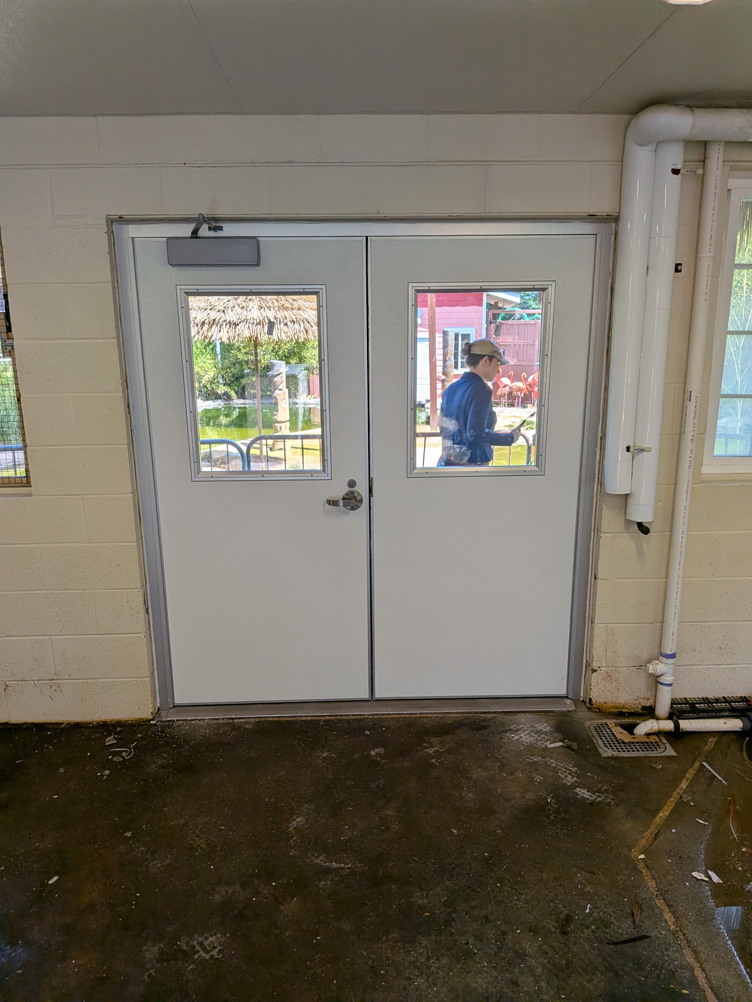 Commercial door hardware and closer installed by Cape May Commercial Door